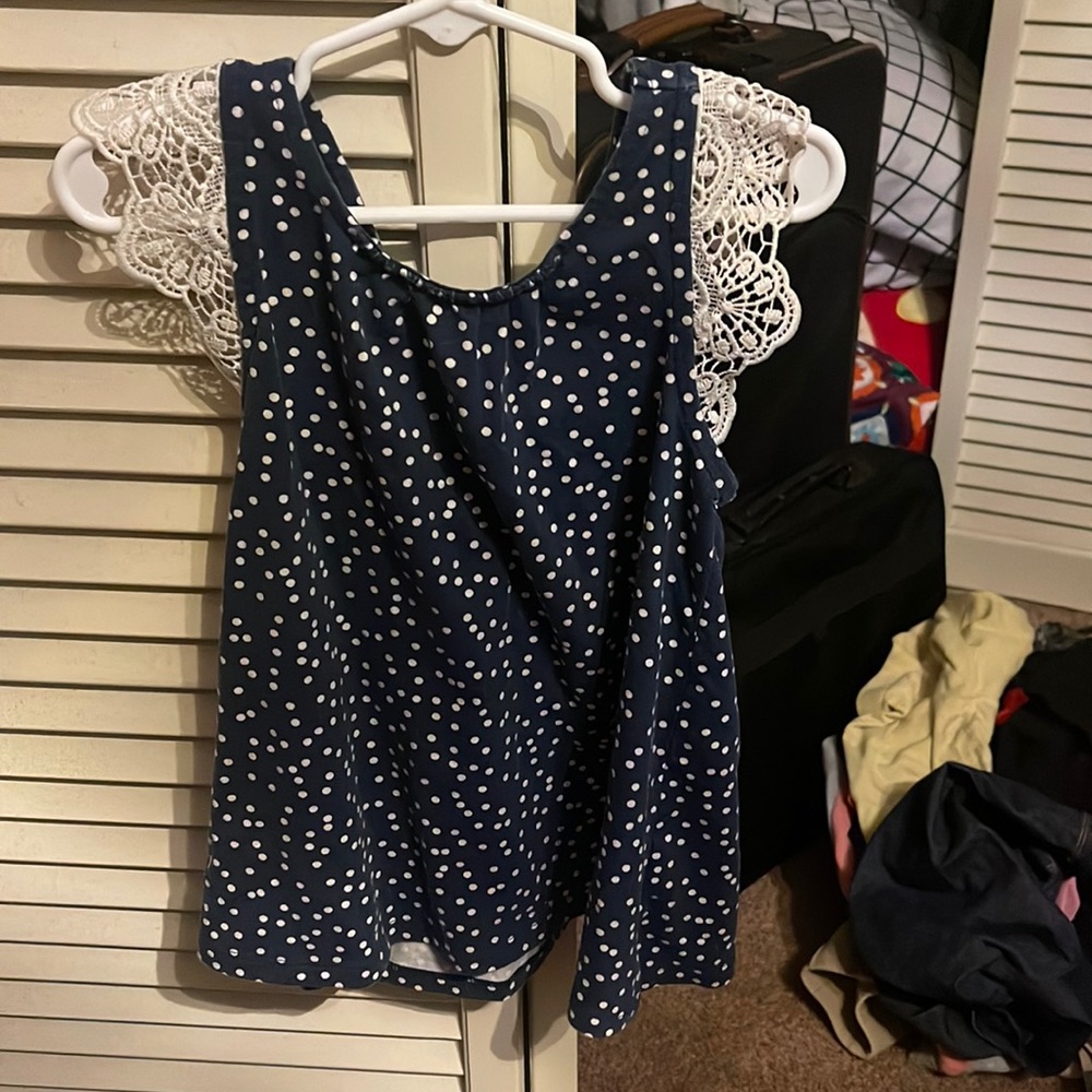 Blue and white tank top with lace sleeves